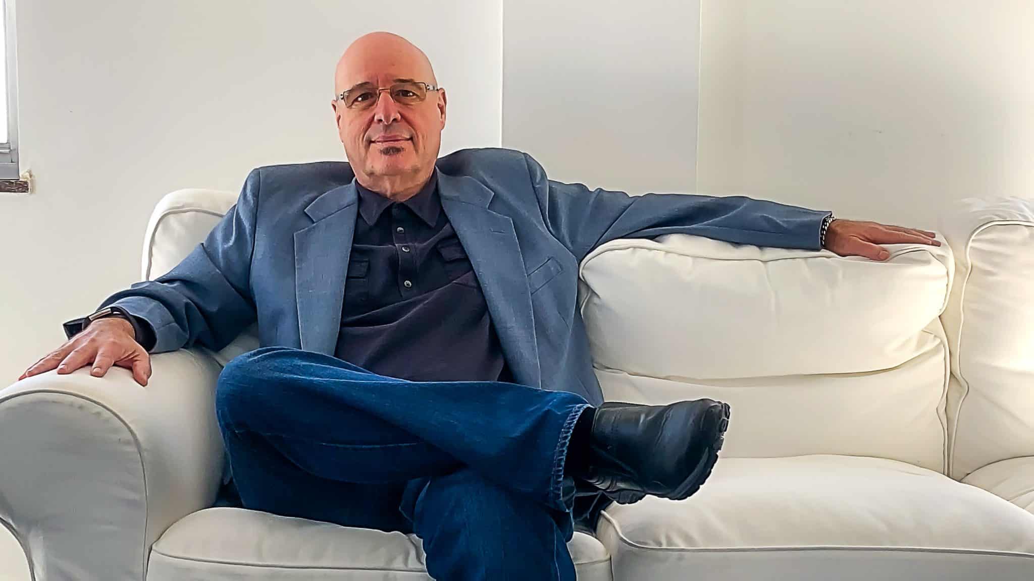 Orlando Jacinto García on couch
